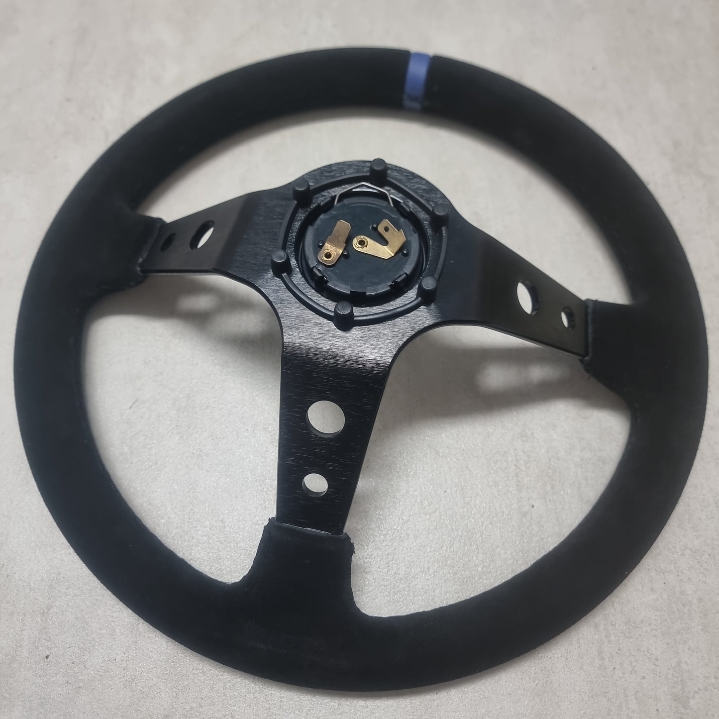 SkidShop suede black/blue steering wheel